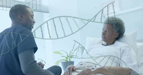 Doctor Consults African American Senior Patient with DNA Concepts