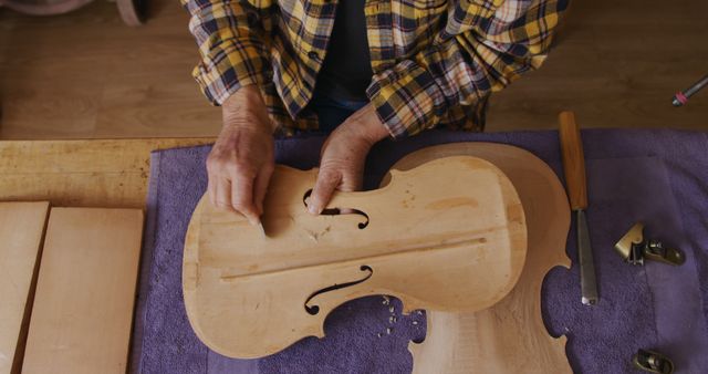 Craftsman Shaping Violin Body in Workshop - Download Free Stock Images Pikwizard.com