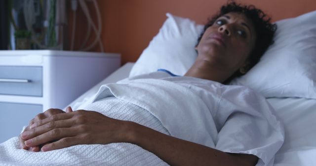 Woman Resting in Hospital Bed - Download Free Stock Images Pikwizard.com