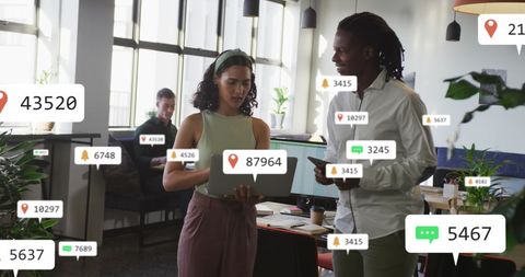 Diverse Coworkers Analyzing Data with Social Media Notifications - Download Free Stock Images Pikwizard.com