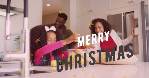 Happy Family Enjoying Christmas Festivities in Kitchen