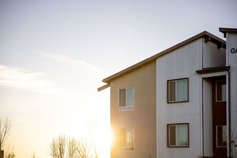 Modern Apartment Building in Sunlit Suburban Setting
