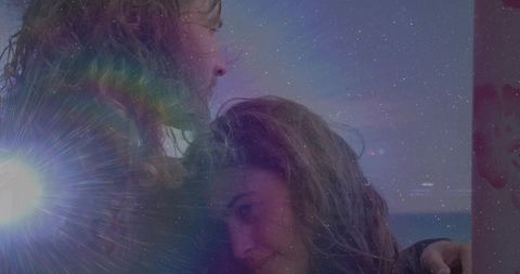 Romantic Couple Embracing at Scenic Beach Sunset