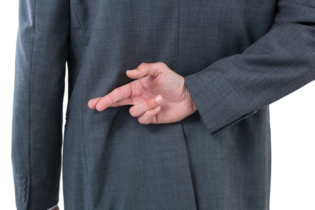 Businessman Crossing Fingers Behind Back - Download Free Stock Photos Pikwizard.com