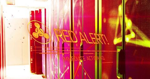 Displaying red alert warning overlay on server racks in data center with flashing leds