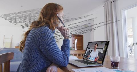 Caucasian Woman in Home Office Video Call with Data Visualization