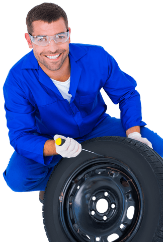 transparent smiling mechanic fixing tire with screwdriver - Download Free Stock Videos Pikwizard.com