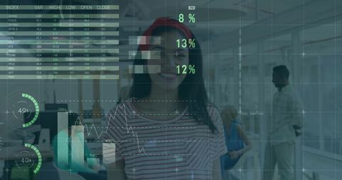 Smiling woman standing in open-plan office displaying data visualization overlays