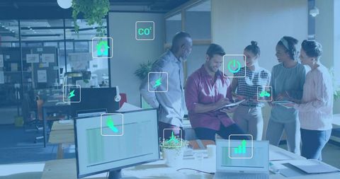 Team collaborating on sustainability analytics and energy efficiency in modern open office
