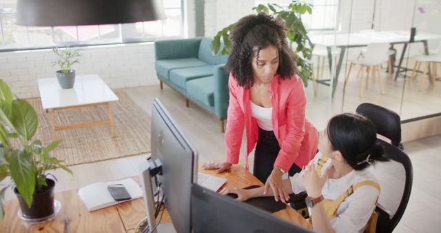 Two Women Collaborating in Modern Office Environment - Download Free Stock Images Pikwizard.com