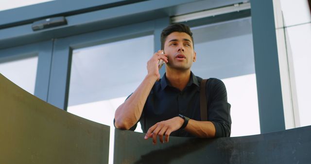 Businessman Making Phone Call in Modern Office - Download Free Stock Images Pikwizard.com