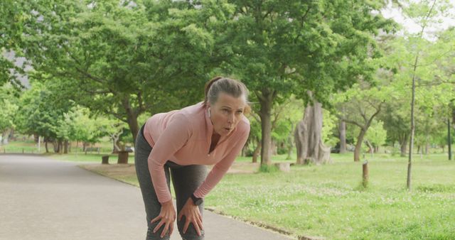 Senior Woman Resting After Running in Park - Download Free Stock Images Pikwizard.com