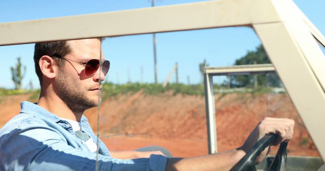 Man Driving Convertible on Countryside Road on Sunny Day - Download Free Stock Images Pikwizard.com