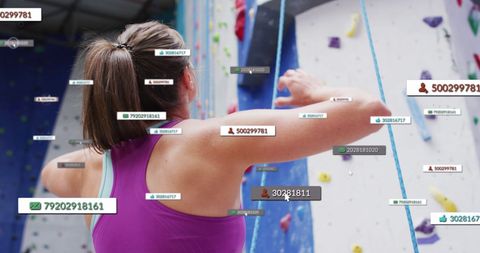 Caucasian woman climbing wall with social media elements