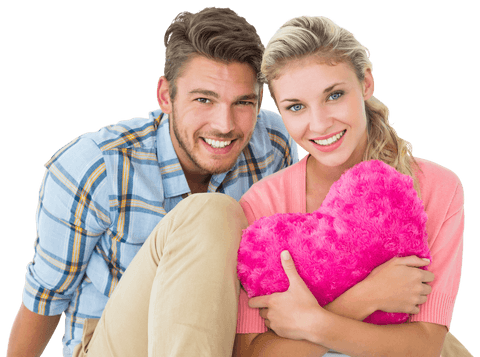 happy couple holding pink heart cushion on transparent background - Download Free Stock Videos Pikwizard.com