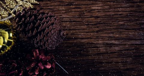 Christmas Decorations with Pine Cones and Snowflakes on Wooden Background - Download Free Stock Images Pikwizard.com
