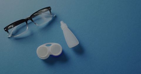 optical essentials with stylish glasses on blue background - Download Free Stock Images Pikwizard.com
