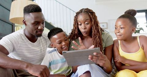 Family bonding with tablet technology and parenthood connection