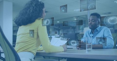 Conducting interview featuring augmented reality overlays in modern coworking workspace