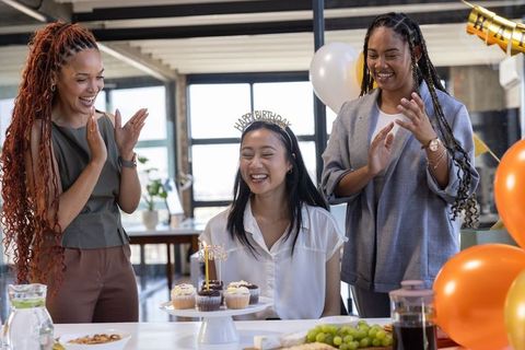 Diverse Female Colleagues Celebrating Birthday in Office