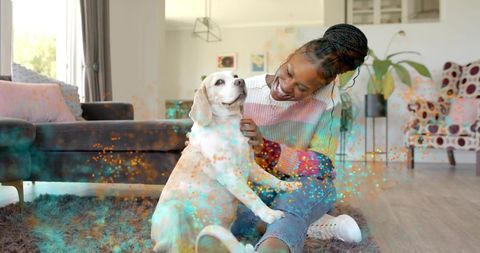 Smiling woman petting happy dog on shag rug in living room conveying cozy companionship