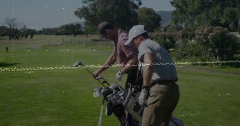 Two golfers selecting clubs on sunlit fairway with digital performance overlay