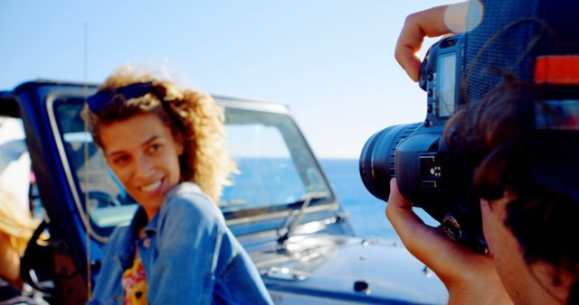 Friends vacationing, capturing adventure with DSLR camera by the sea - Download Free Stock Images Pikwizard.com