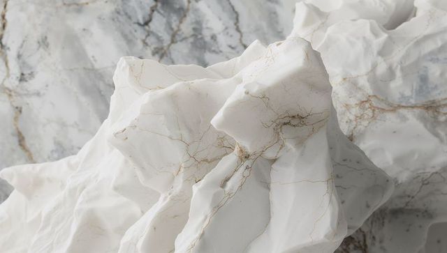 Luxurious white marble rock formation with golden-grey veins