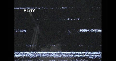 Retro vcr screen with static and play overlay