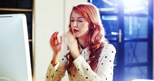 Focused Woman with Red Hair Working at a Computer in Bright Office - Download Free Stock Images Pikwizard.com