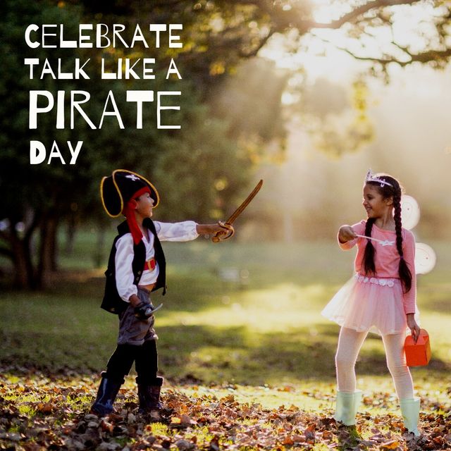 Biracial siblings dressed in pirate and princess costumes play with enthusiasm in a park. Leaves cover the ground, suggesting autumn. The image is perfect for use in marketing materials for children's events, seasonal celebrations, or diversity and inclusion campaigns.
