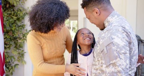 Returning African American Soldier Reunites with Family