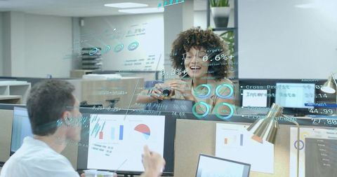 Businesswoman Collaborating with Digital Analytics in Modern Office