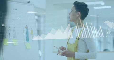 Innovative professional woman analyzing data in modern office