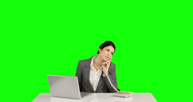 Businesswoman on Phone at Desk with Green Screen Background - Download Free Stock Images Pikwizard.com