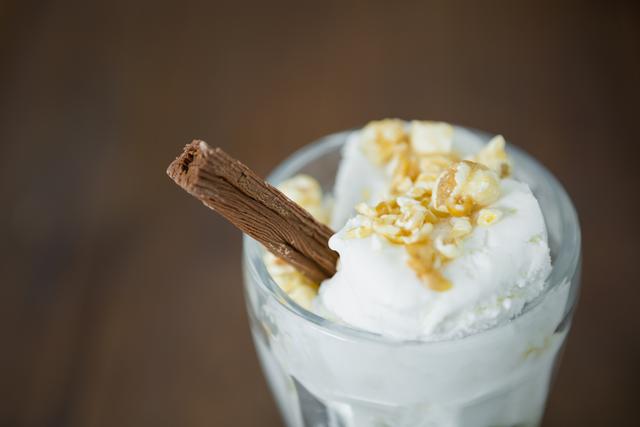 Vanilla Ice Cream with Chocolate Stick and Caramel Popcorn - Download Free Stock Photos Pikwizard.com