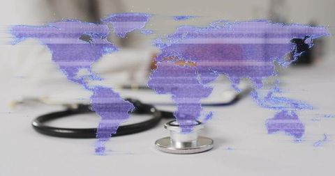 Global health network overlaying stethoscope with holographic map glitching