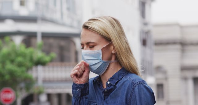 Young Caucasian Woman Coughing in Face Mask on City Street - Download Free Stock Images Pikwizard.com