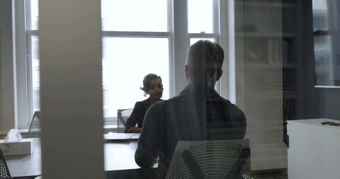 Business Colleagues Meeting in Modern Office With Glass Walls