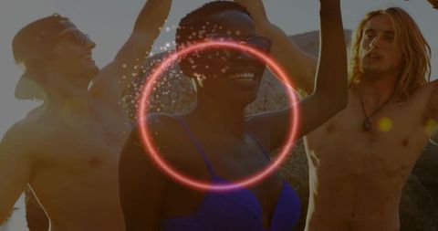 Sunlit beach party friends smiling in swimwear with neon halo overlay and lens flare