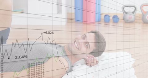 Smiling Man in Fitness Center with Overlay Graphs of Growth
