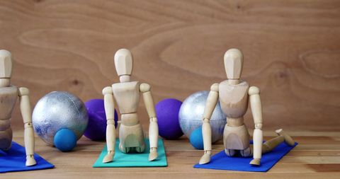 Wooden Mannequins Doing Yoga With Exercise Balls Background - Download Free Stock Images Pikwizard.com