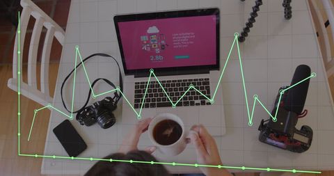 Businesswoman Analyzing Data on Laptop Shows Statistics Growth