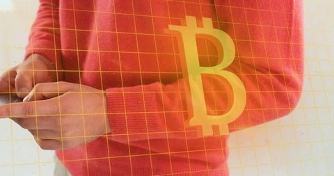 Person Holding Smartphone with Bitcoin Overlay and Digital Grid