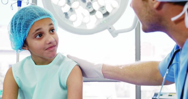 Young Patient Comforted by Doctor Before Surgery - Download Free Stock Images Pikwizard.com