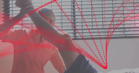 Therapist guiding assisted leg stretch with red motion analysis overlay for mobility training