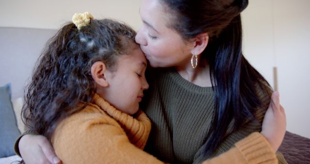 Mother Comforting Daughter with a Warm Hug at Home - Download Free Stock Images Pikwizard.com