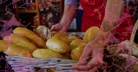 Artisan Baker Holding Fresh Rustic Bread Basket in Bakery Shop