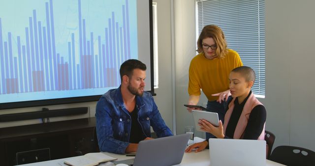 Business Team Collaborating on Data Analytics Project in Meeting Room - Download Free Stock Images Pikwizard.com