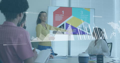 Business Team Analyzing Data Presentation in Modern Office